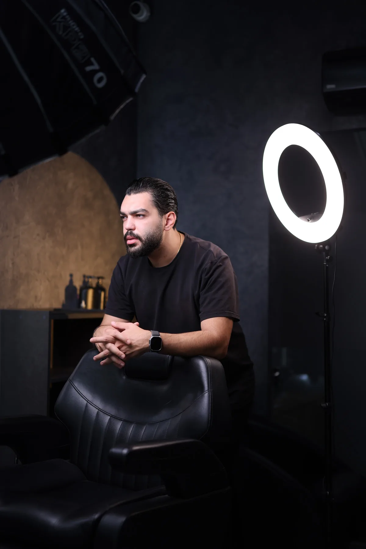 Andy Nasry, founder of Ace Barbershop, at the chair